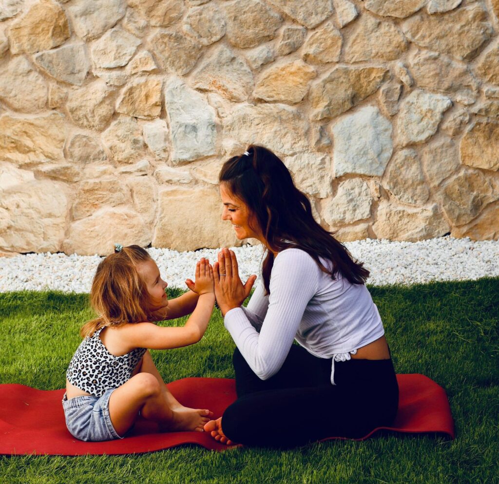yoga with child outside